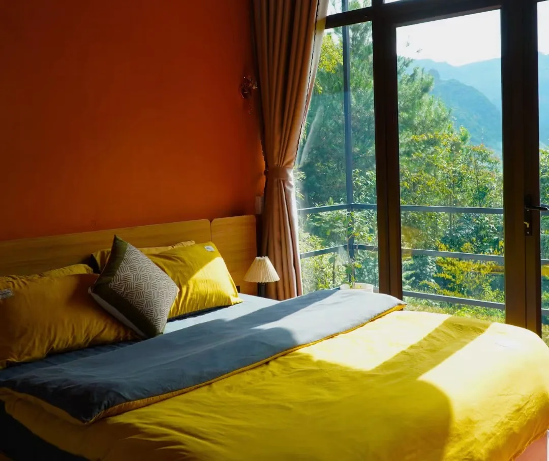 Double room with mountain-view window at Jashill Homestay, Du Gia, August 2026